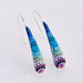 Stylish Crystal & Silver Drop Earrings showcased with a shimmering convex design for elegant fashion.