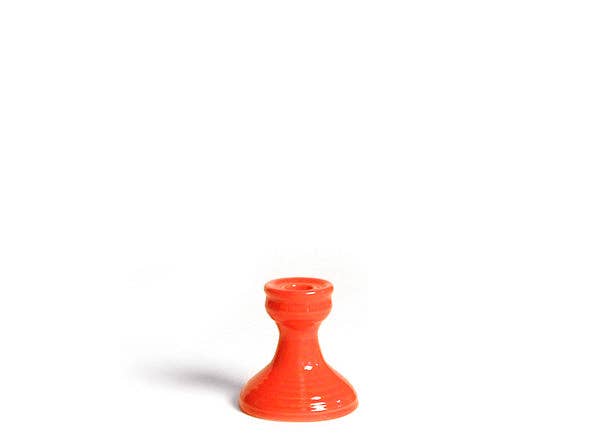 orange candlestick holder