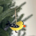 Charming Felt Bird Ornaments hanging on a Christmas tree, spreading holiday cheer.