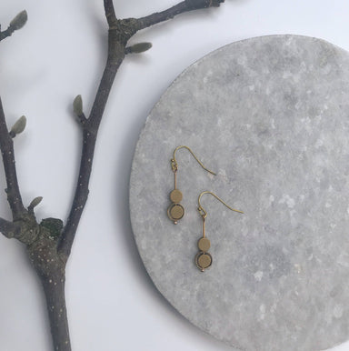 Small brass kinetic circle earring