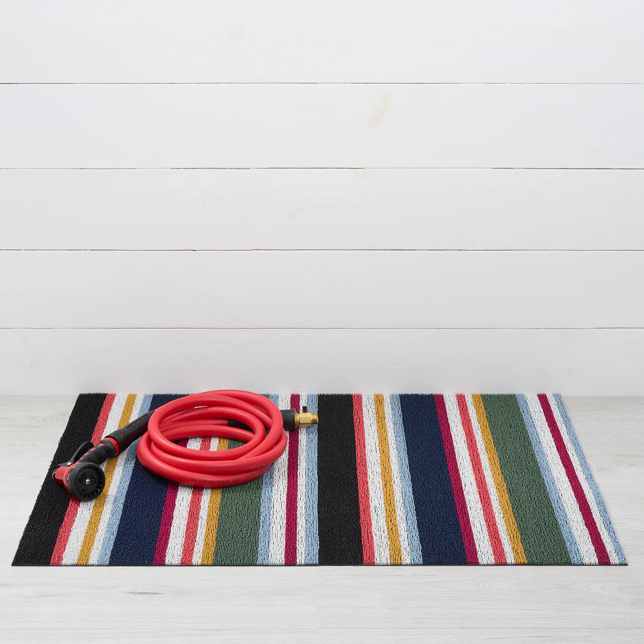 Vibrant Shuffle Stripe Shag Mat featuring a sophisticated design, ideal for bathrooms and patios.