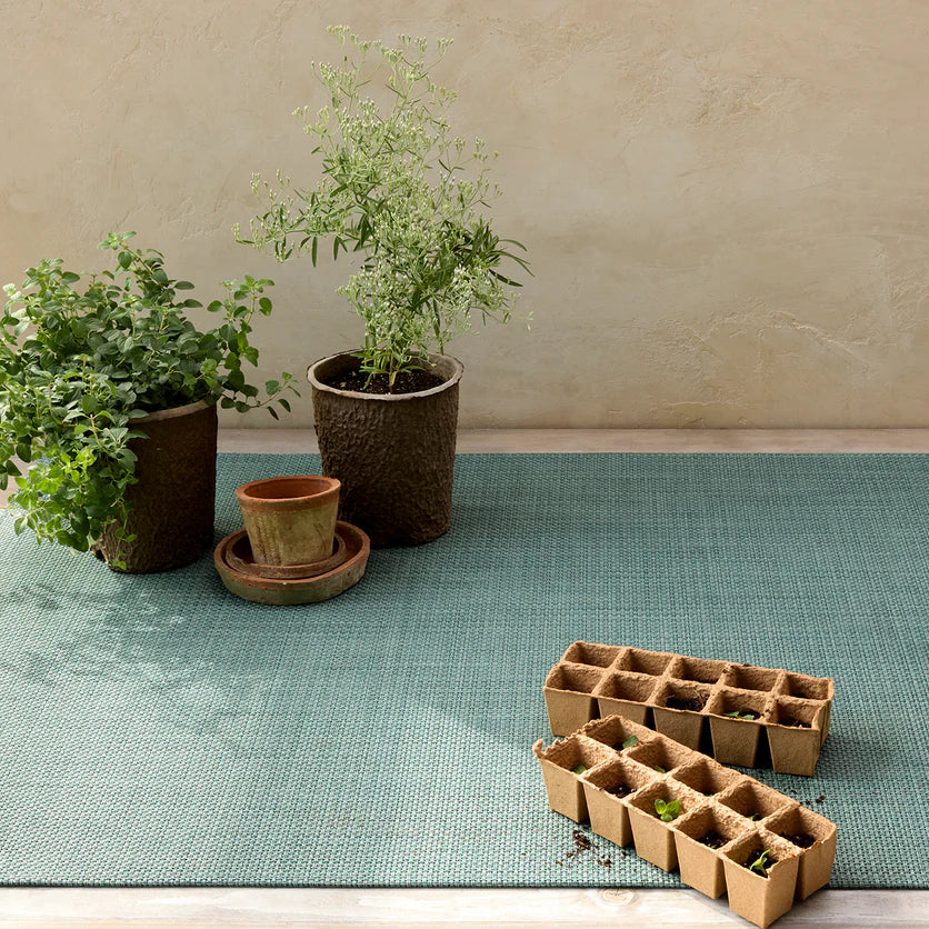 Basketweave Woven Floor Mat displayed in a modern living space, perfect for indoor and outdoor use.
