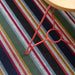 Outdoor setting with the Shuffle Stripe Shag Mat, highlighting its slip-resistant and easy-to-clean features.