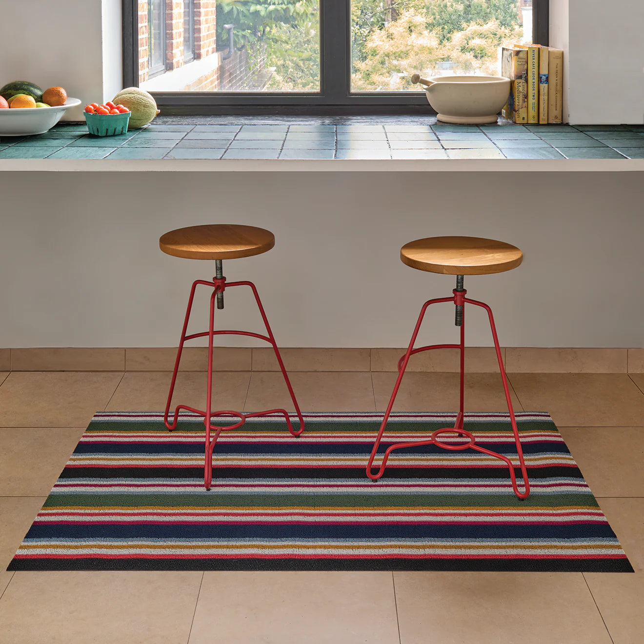 Shuffle Stripe Shag Mat in vibrant colors by Chilewich, showcasing a dynamic striped design perfect for indoor and outdoor use.
