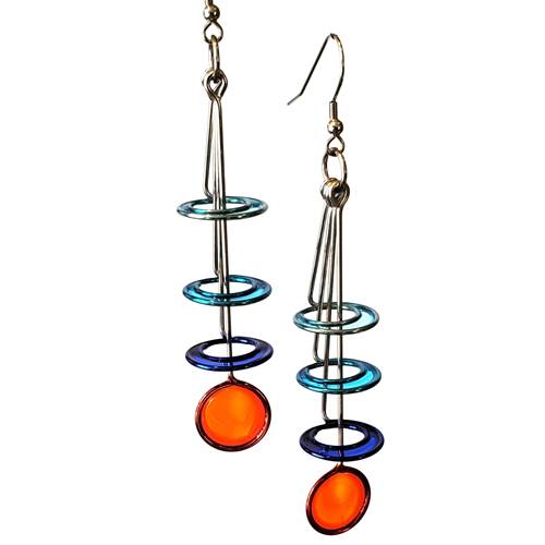 Triple Stacked Orbit Circle Drop Earrings designed by Christopher Royal, showcasing an elegant blend of stainless steel and translucent resin in a unique and playful design.