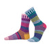 Colorful Petunia Crew Socks from Solmate Socks featuring a blend of light pink, purple, teal, yellow gold, light blue, and magenta patterns, made from recycled materials.