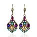 Multicolored gemstone drop earrings with intricate designs 