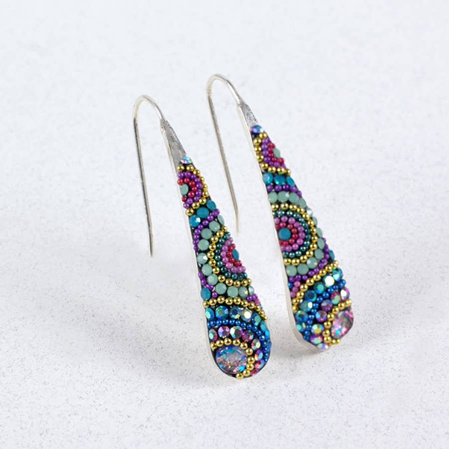 Close-up view of Crystal & Silver Drop Earrings highlighting the sparkling teardrop shape and solid silver hook.