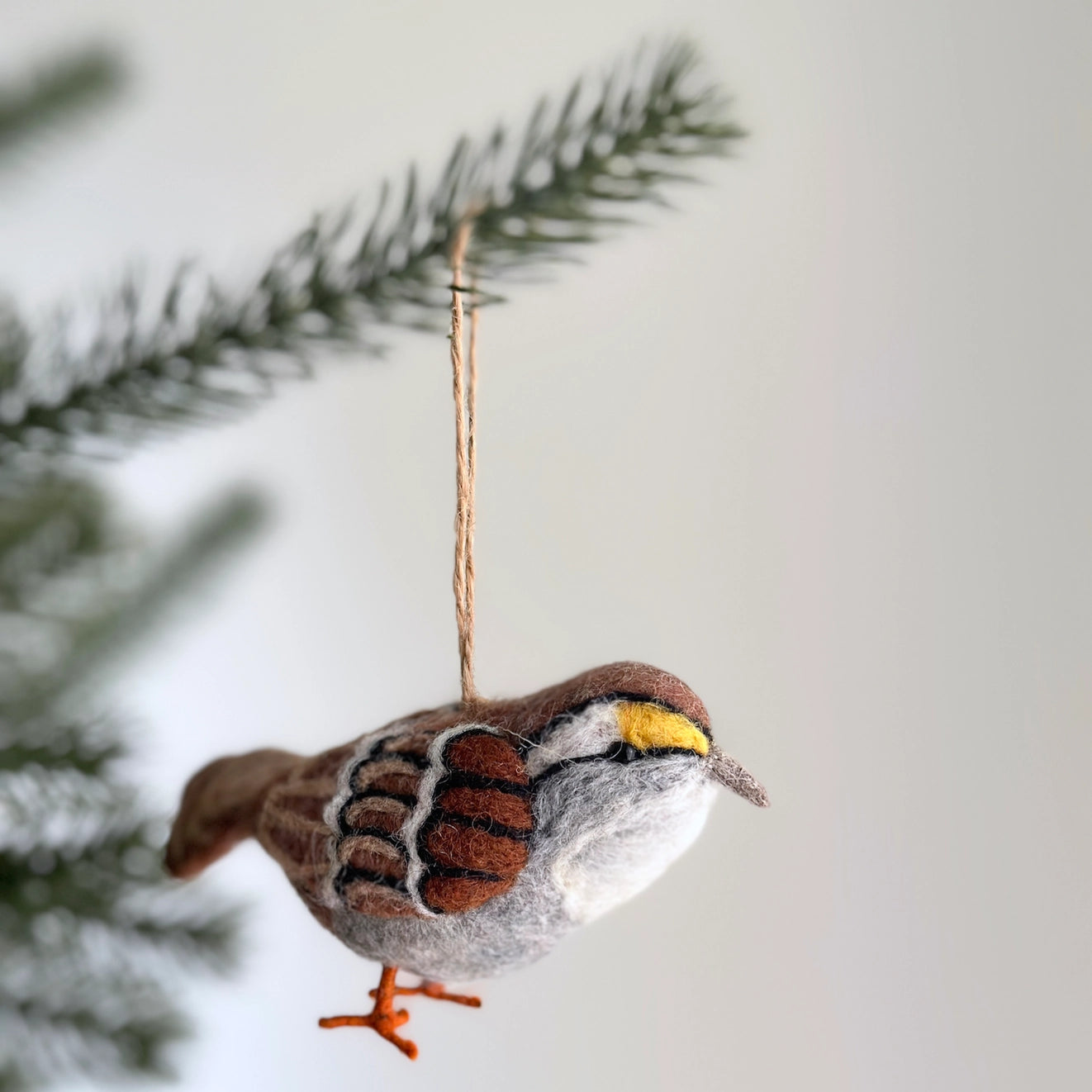 Beautifully crafted Felt Bird Ornaments, fair-trade and designed in Florida, perfect for enhancing your holiday decor.