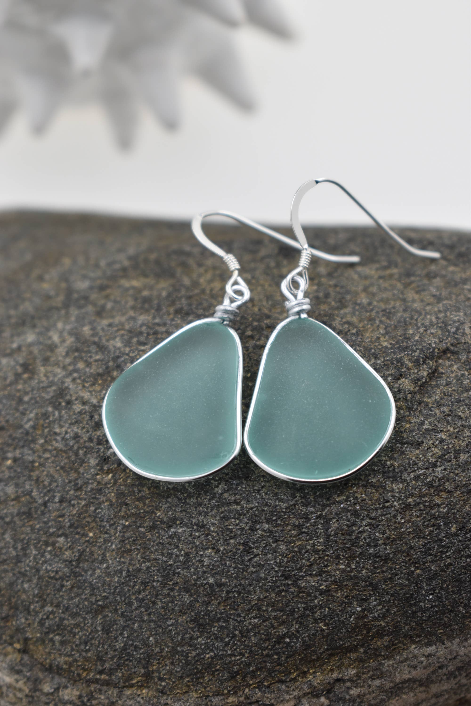 Eco Glass Bezel Drop Silver Earrings in Aqua showcasing their stunning frosted glass design and elegant sterling silver setting.