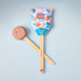 Strawberry Seed Pop from Modern Sprout with a clay coating and wooden stick, part of the Garden Seed Pop series, ideal for interactive gardening.