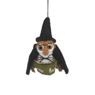 Felt owl ornament wearing a black hat and green sweater 
