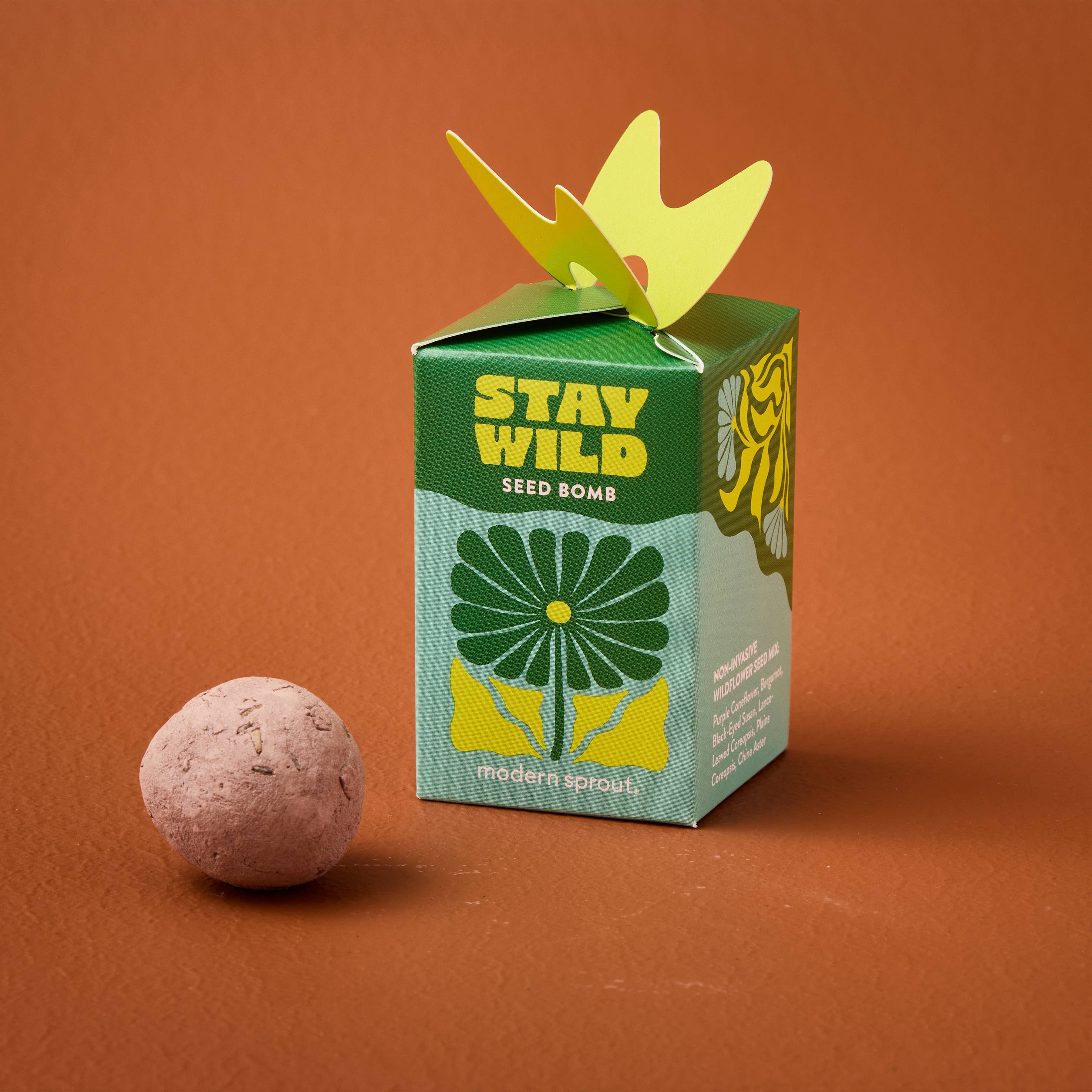 Modern Sprout Seed Bomb Refresh - Stay Wild packaging showcasing a bright green aesthetic with floral graphics, designed for wildflower growth.