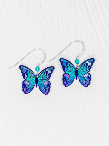 Mariposa Butterfly Earrings: Sterling silver ear wires and niobium combine to create a whimsical, lightweight accessory that daintily flutters from your earlobes like a fancy insect party on your head!