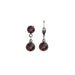Pair of silver drop earrings with red gemstones