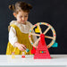 Little girl playing Wooden Ferris Wheel Carnival Play Set