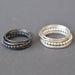 Charming Silver Stacking Rings - set of 4, perfect for when you can't pick just one! Featuring a square band and a dotted band, these rings are stylishly rustic.