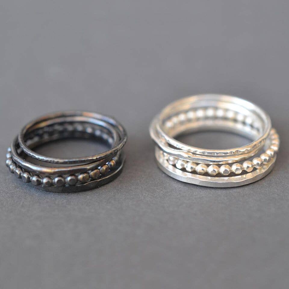 Charming Silver Stacking Rings - set of 4, perfect for when you can't pick just one! Featuring a square band and a dotted band, these rings are stylishly rustic.