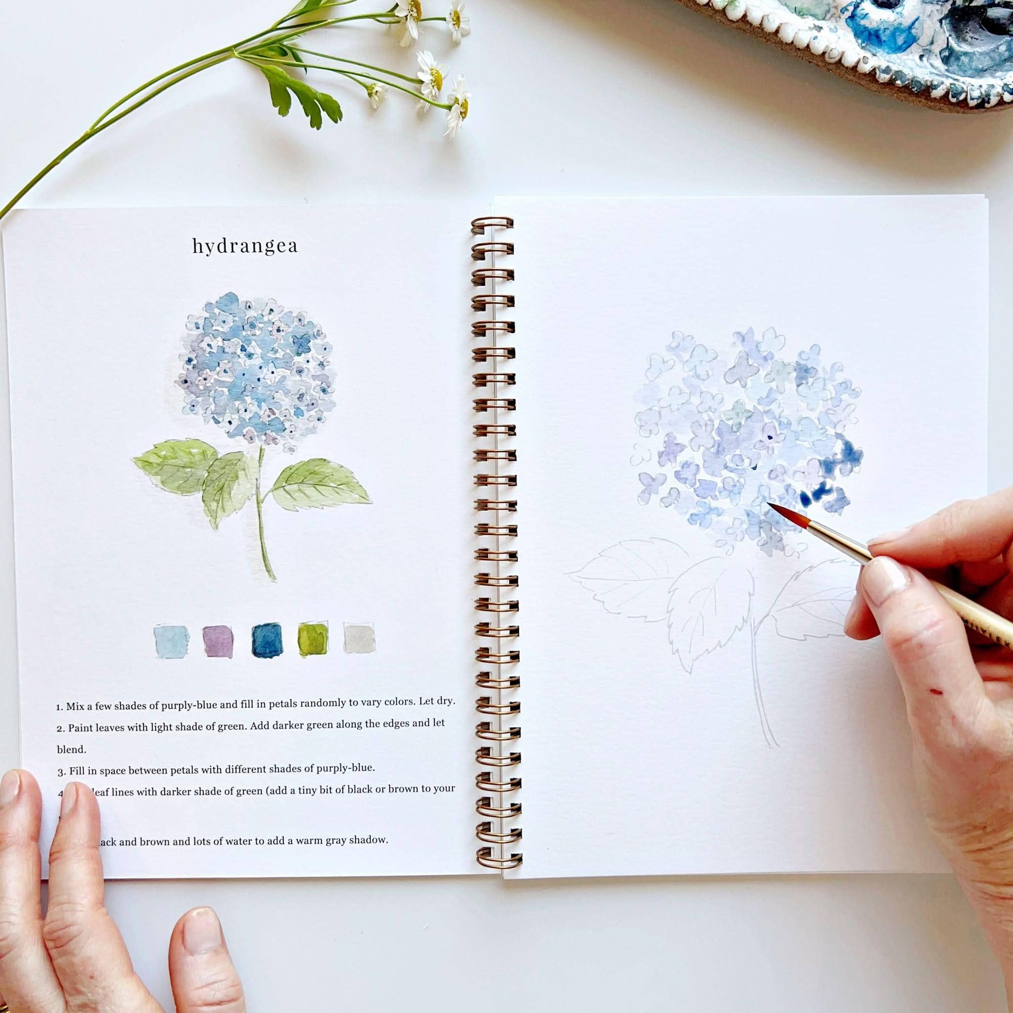 Flowers Watercolor Workbook cover featuring vibrant floral illustrations for painting fun.