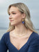 Atlas Earrings from Holly Yashi, featuring 18K gold-plated cosmic charm with a niobium sphere and intricately designed constellation artwork, perfect for stylish stargazing.