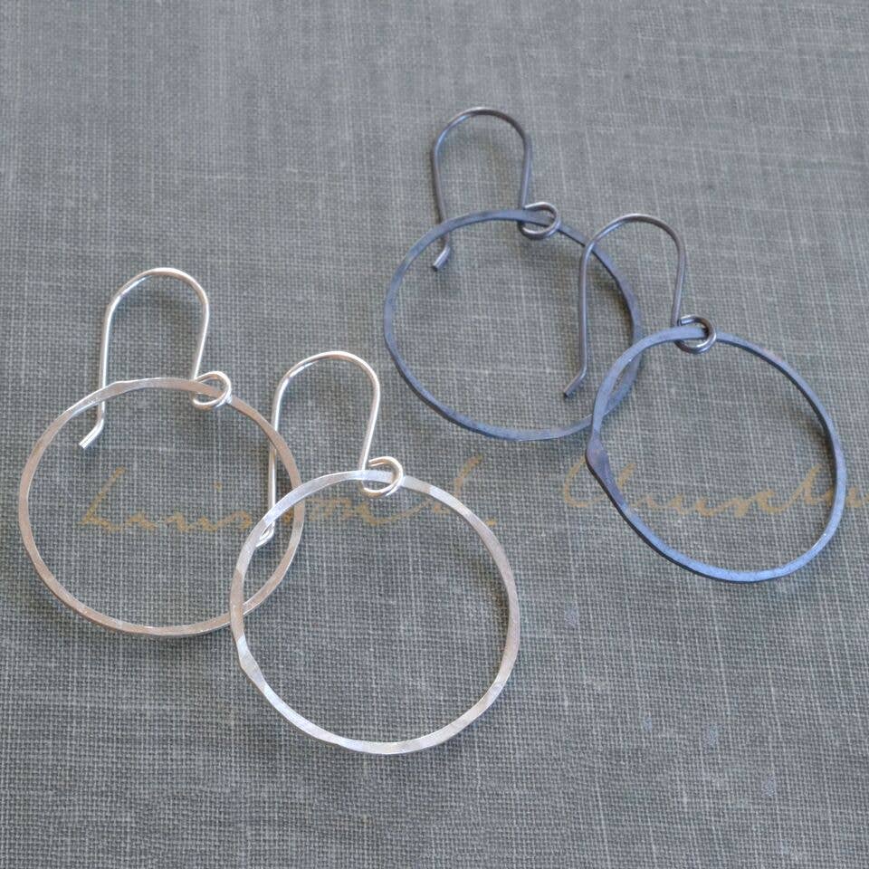 Medium Silver Hoops: The stylishly simple, everyday earrings that make your lobes look good while weighing less than your shopping list.