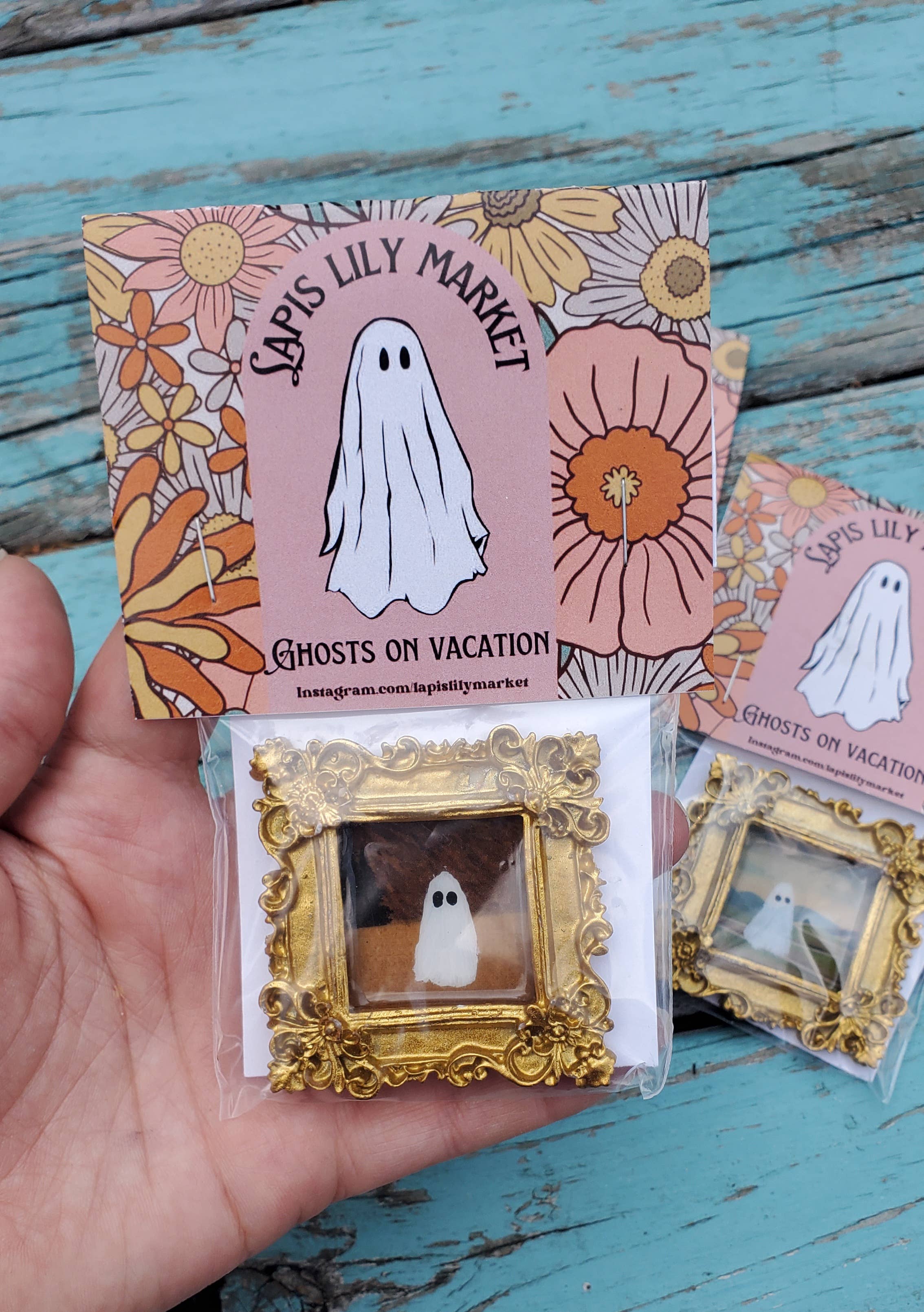 Ghosts on vacation in gold mini frame