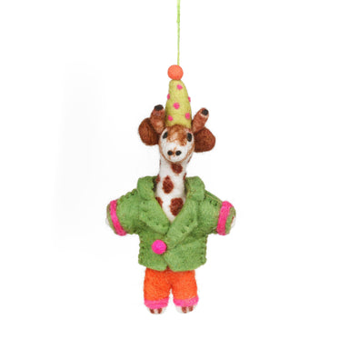 Felt giraffe ornament wearing a green jacket and orange pants