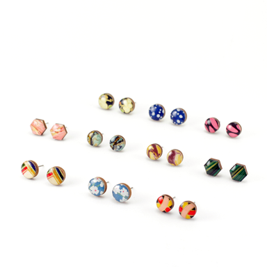 Patterned mini titanium stud earrings featuring unique Japanese Chiyogami and marbled paper designs, perfect for sensitive ears.
