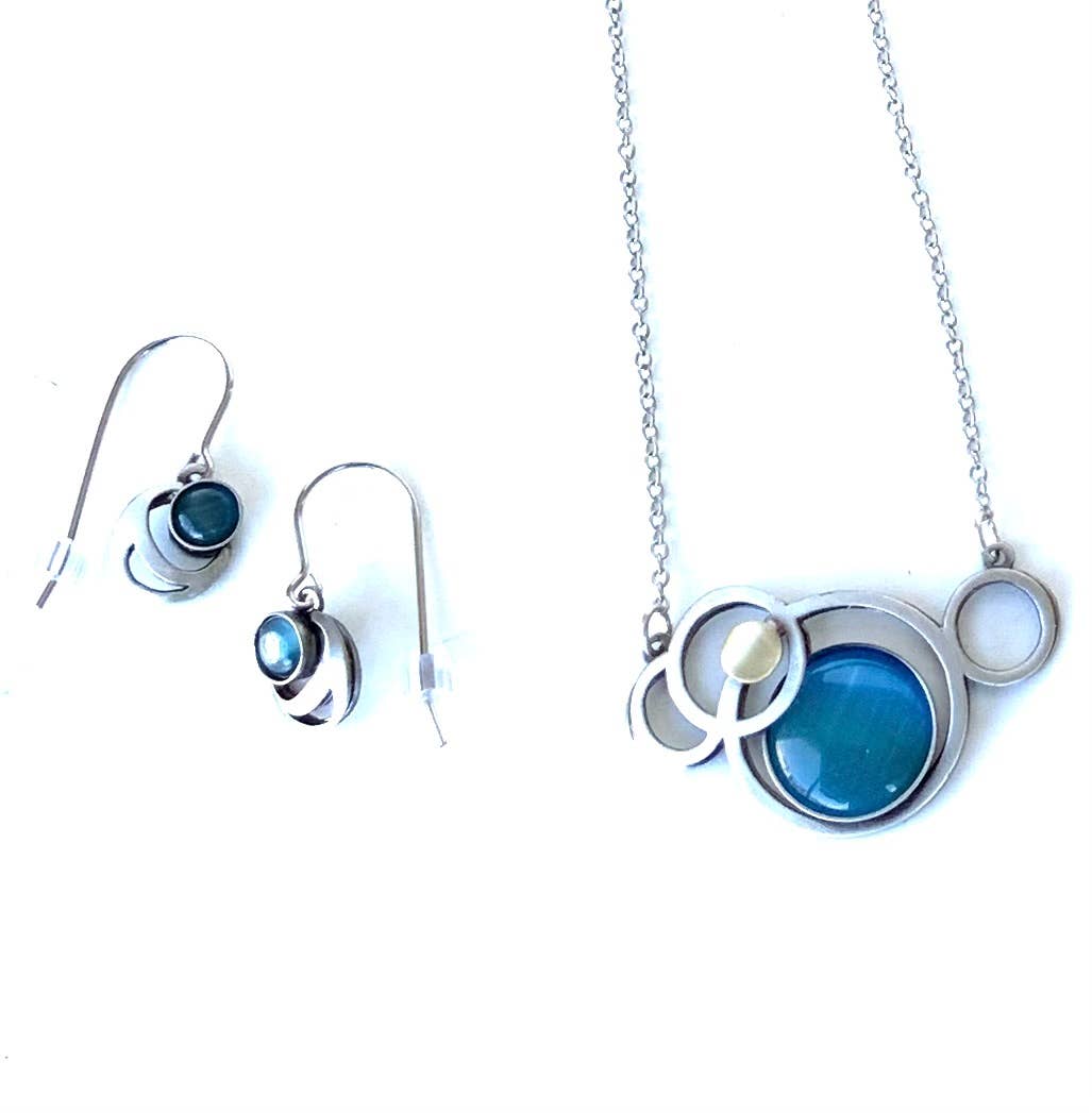 steel jewelry with blue gemstones