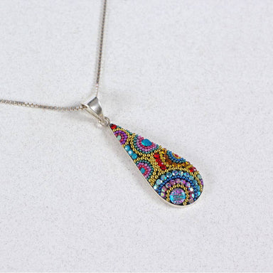 Stylish close-up of the Morning Drop Pendant, highlighting its minimalistic and meaningful beauty.