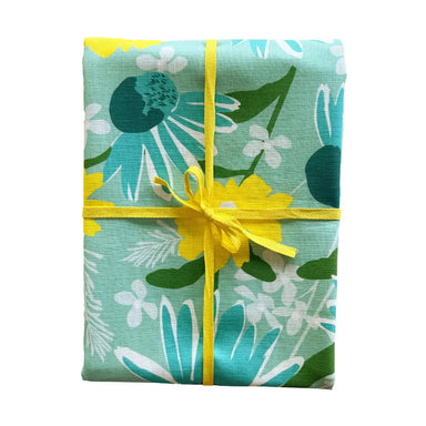 Quality 100% cotton Elizabeth Grubaugh Tablecloths measuring 60 x 96 inches, featuring beautiful blue echinacea flowers.