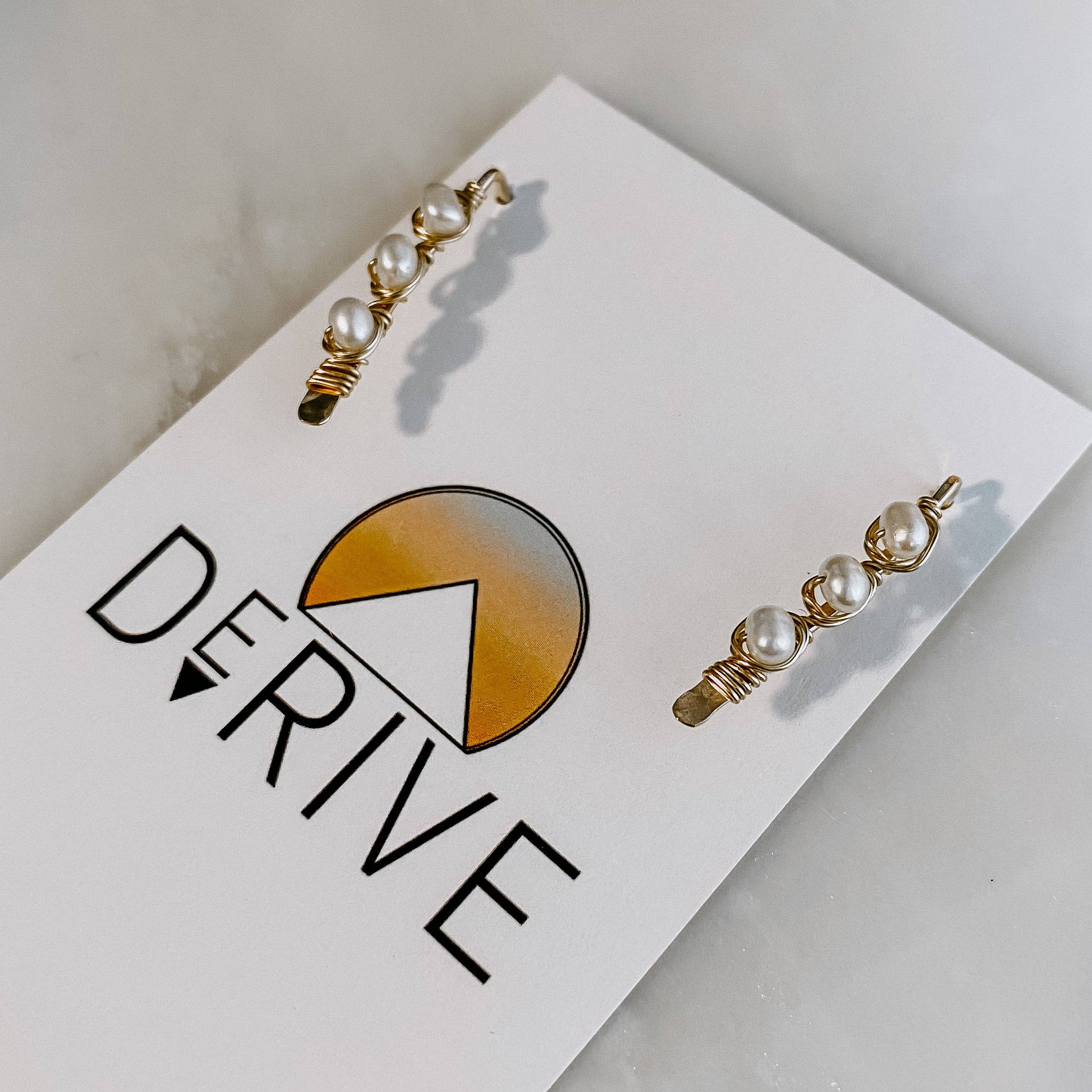 Elevate your ear game with these Pearl Ear Climbers - perfect for turning heads and not just your ears!