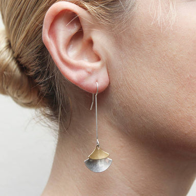 Extended Layered Rounded Triangles Drop Wire Earring by Marjorie Baer, worn elegantly, showcasing its architectural design with layering.