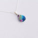 Dew Drop Pendant by Mosaico Jewels showcasing its delicate design and sparkling finish.
