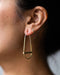 gold hollow hoop with crossbar earrings
