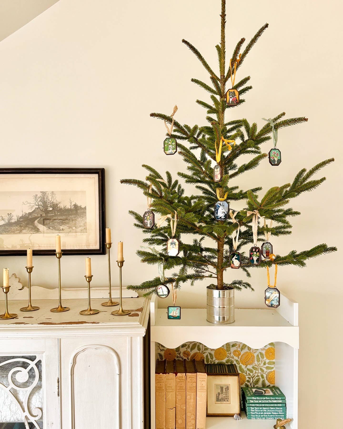 Christmas tree decorated with Vintage-style art locket ornament.