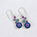 Elegant close-up of the Crystal & Silver Round Earrings, perfect for adding a modern edge to any outfit.