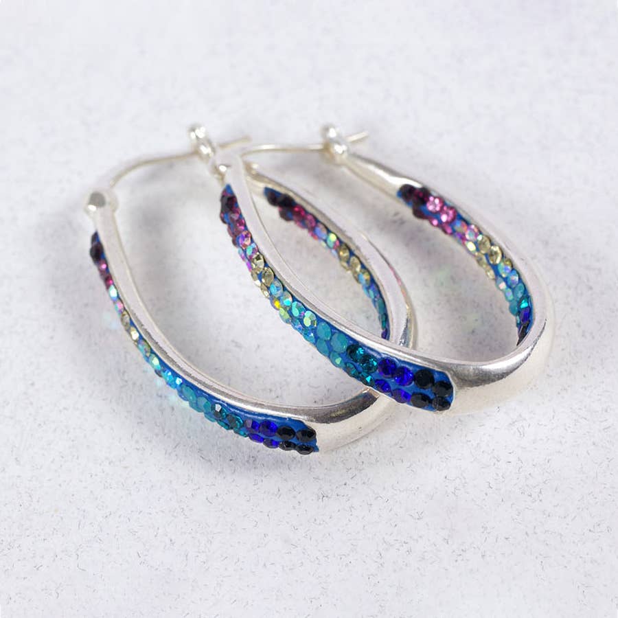 Stylish Crystal Hoop Earrings by Mosaico Jewels with a gradient of blue and green sparkling crystals incorporated into a unique hoop design.