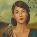portrait of a woman holding a bird