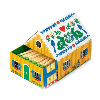 Swedish Dream Tiny Living Matchbook Cottage in yellow design by Kalastyle Soap Co. featuring green-tipped matches and detailed floral patterns.