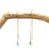 Sea Glass Golden Threaders by Suzanna Garrett Designs — icy blue sea glass pops against the warm finish of these long golden threaders
