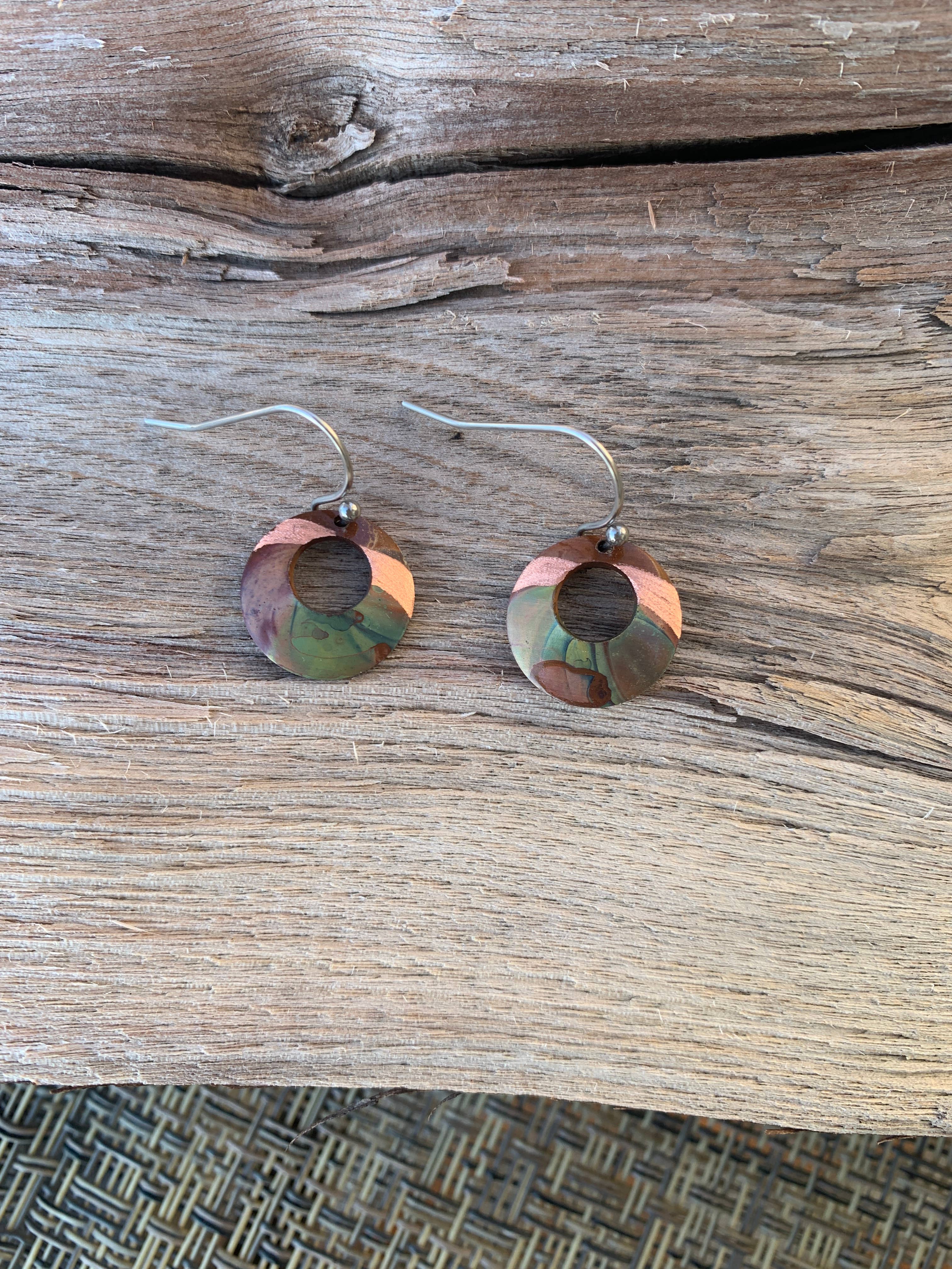 Small circle fire painted copper earrings