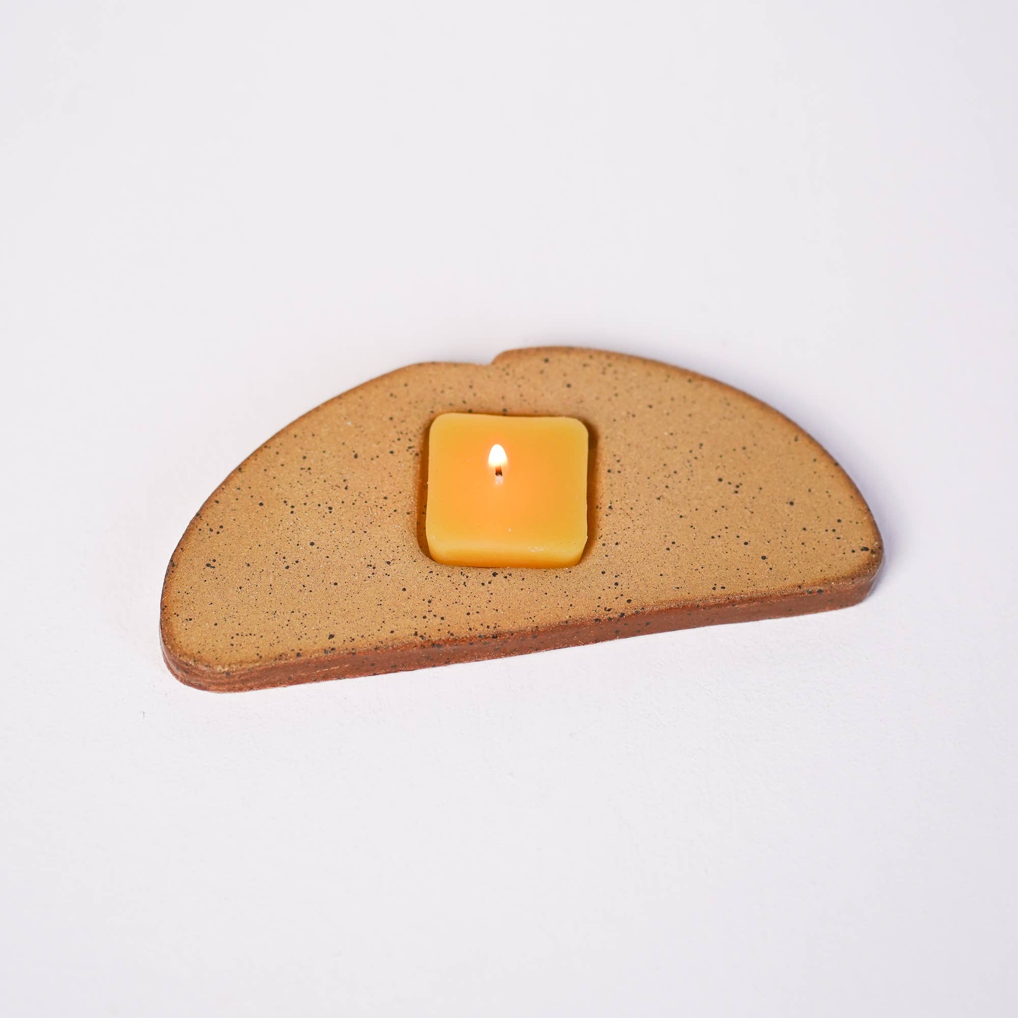 ceramic toast with butter candle holder
