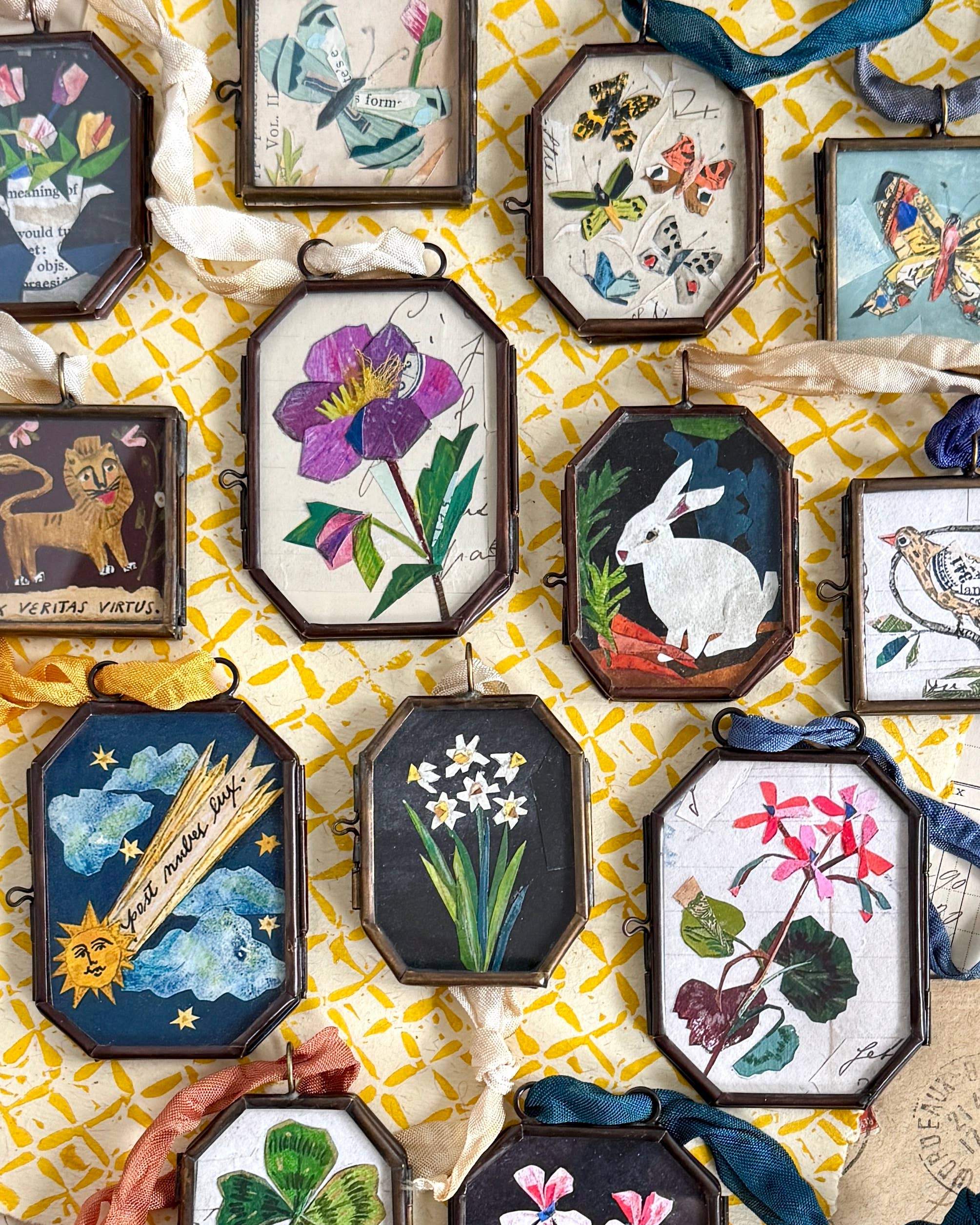 Vintage-style art locket ornaments.