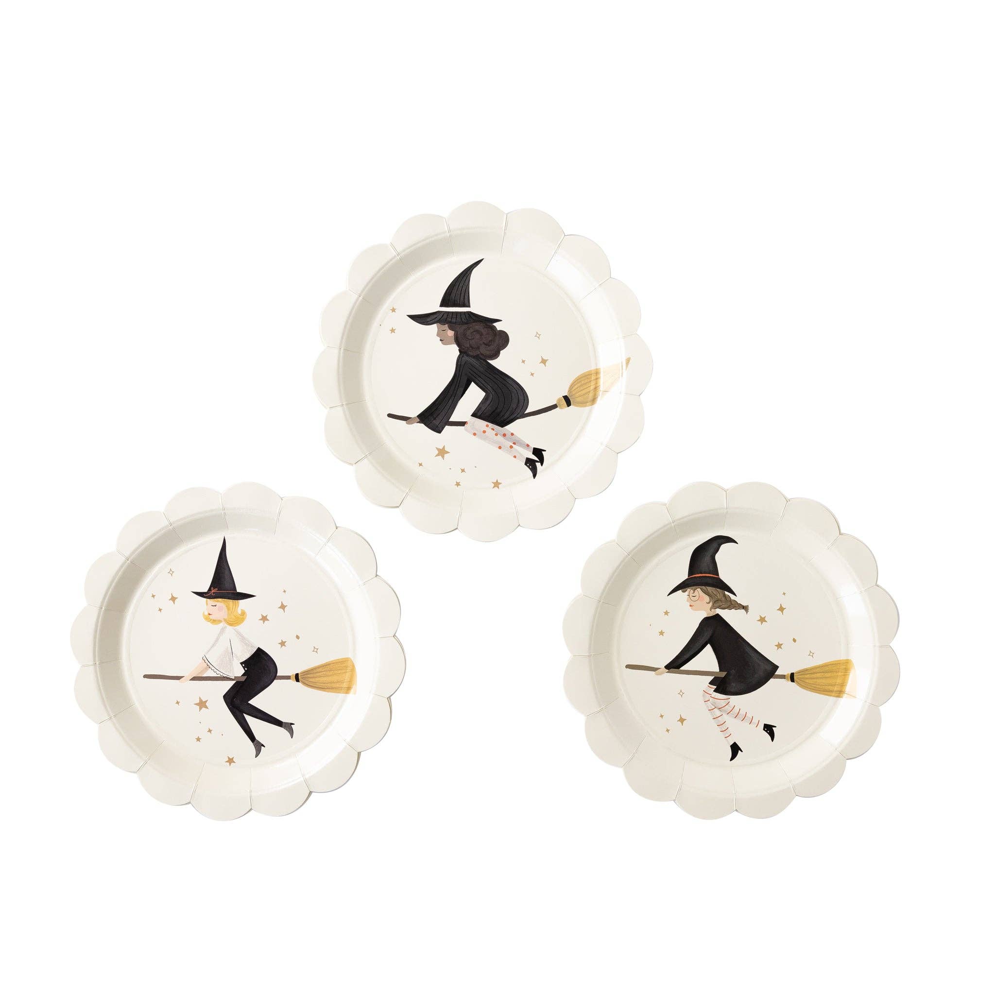 scalloped paper plates with flying witches on a broom