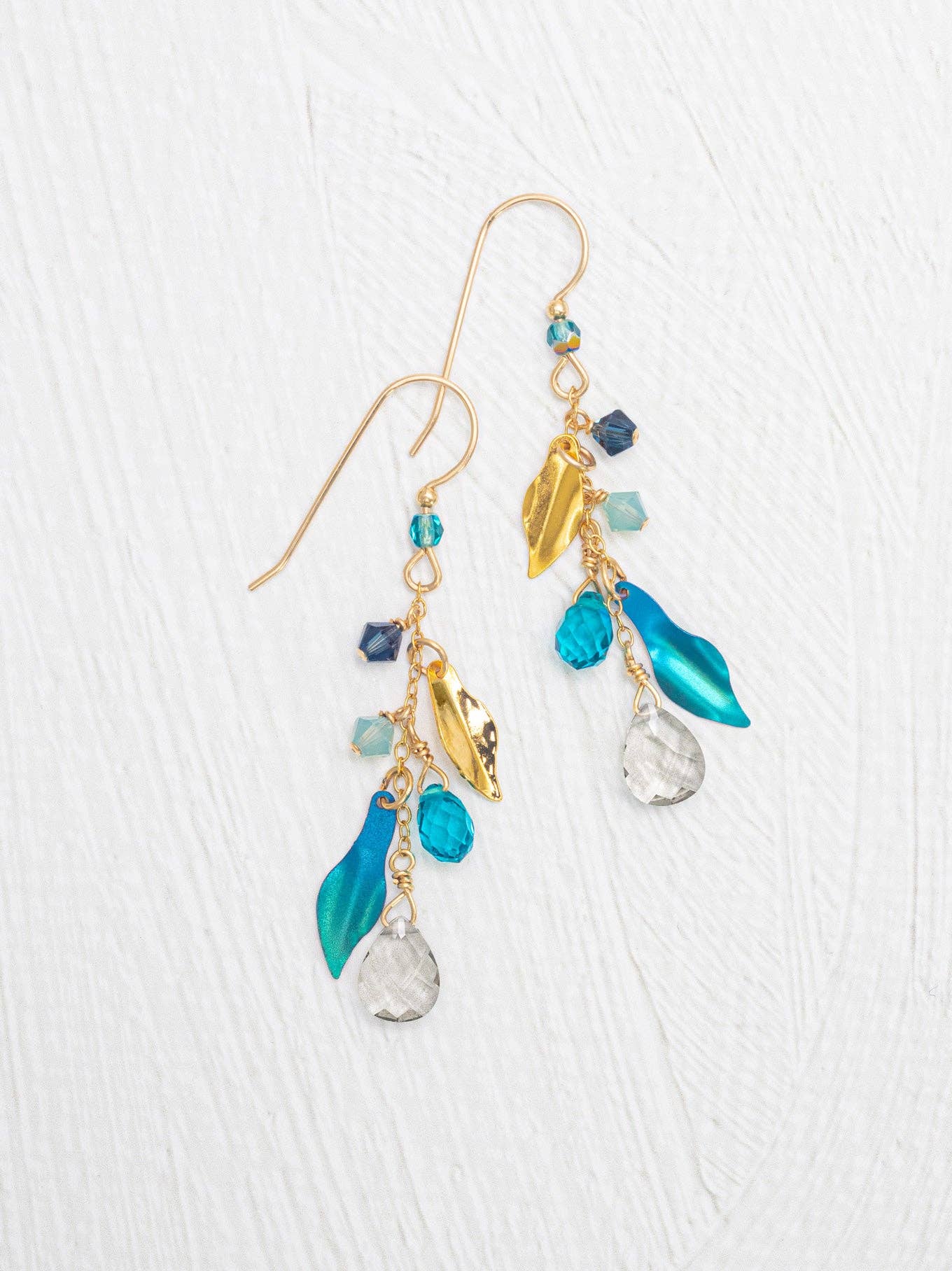 Petite Calliope Earrings, perfect for making a fashion statement without saying a word—unless they start talking, then it's time to worry!