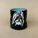 Medium Lucky Bat Cup by The Bowl Maker, featuring an artistic design of a bat in flight with a vibrant blue interior.