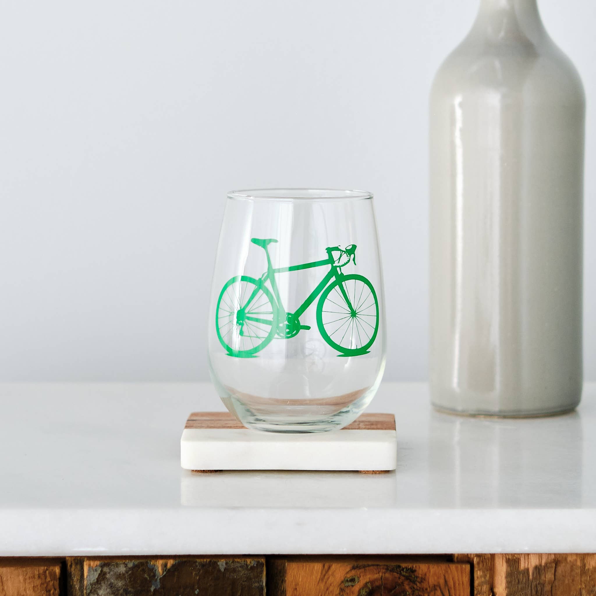 wine glass with green bicycle print