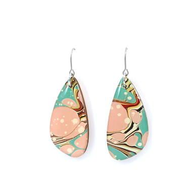 Mint green and pink modern marble dangle earrings featuring hand-marbled UK paper and titanium wire hooks.