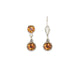 Pair of silver drop earrings with orange gemstones